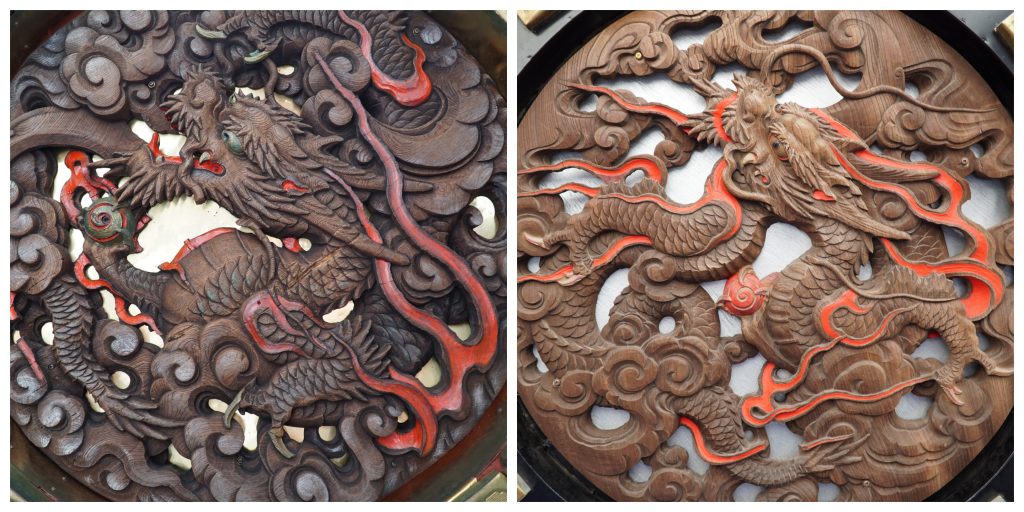 Dragon carvings under lanterns at Senso-ji temple