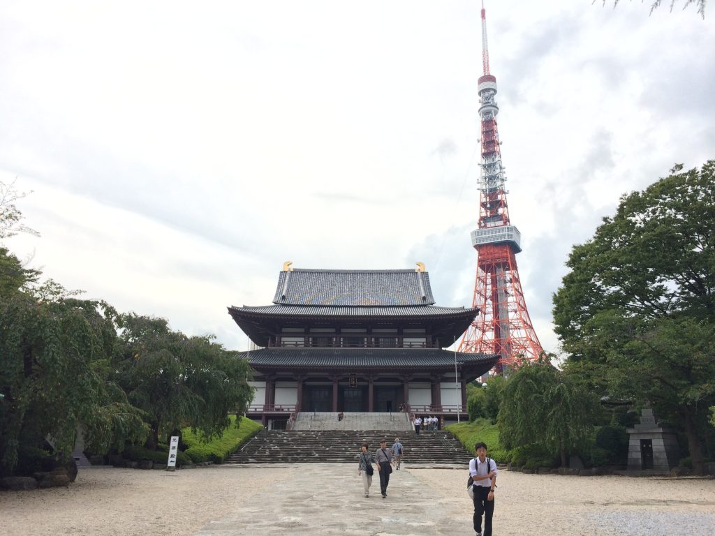 Tokyo Tower seen in the background behind Zojo-ji temple.